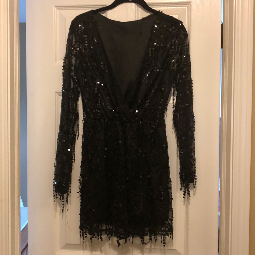 Short jumpsuit with sequins